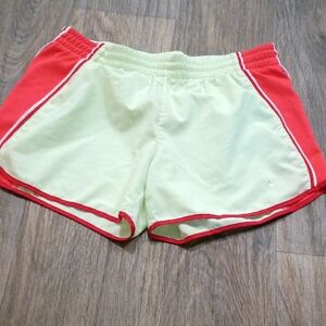 Nike Women’s Light Green Shorts with Red Trim
